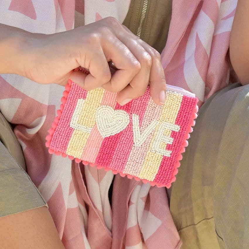 SMALL PINK BEADED LOVE STRIPED POM POM PURSE