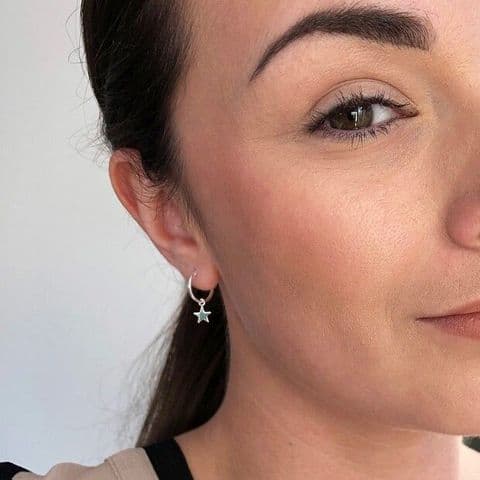 STERLING SILVER STAR CHARM HUGGIE HOOP EARRINGS