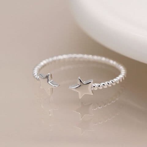 STERLING SILVER TWIST AND STARS RING