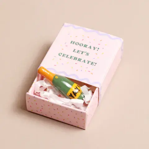 TINY MATCHBOX CERAMIC CHAMPAGNE TOKEN