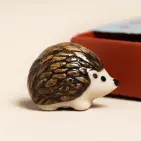 TINY MATCHBOX CERAMIC HEDGEHOG TOKEN