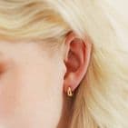 WIDE DOMED HUGGIE HOOP EARRINGS GOLD