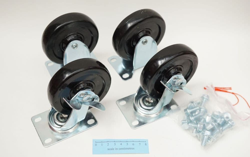 a set of 4 trolley wheels with set screws