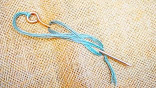 Anglo-Saxon Bronze cloak pin Blacknall Field Grave 93 with green linen string