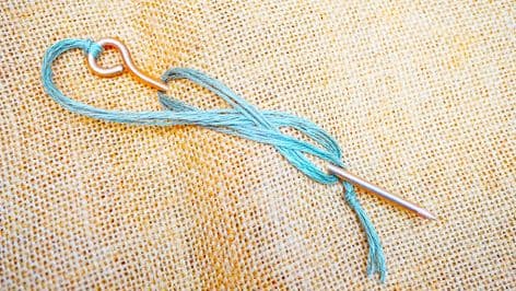 Anglo-Saxon Bronze cloak pin Blacknall Field Grave 93 with green linen string