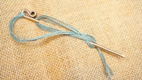 Anglo-Saxon bronze dress or cloak pin Mucking grave find with green linen string