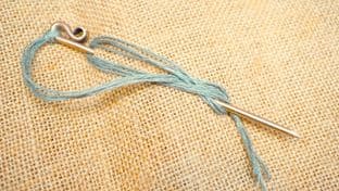 Anglo-Saxon bronze dress or cloak pin Mucking grave find with green linen string