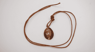 Anglo-Saxon cowrie shell fertility pendant with faux cotton thread