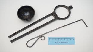 medieval alchemists cupellation dish hook and tongs