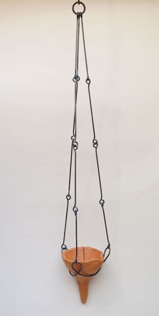 medieval pottery cresset oil lamp and suspension chain in forged steel