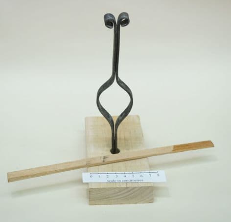 medieval rushlight or splint holder and wooden base