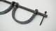 medieval slave or prisoner hand shackles on a cross bar