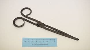 medieval surgeons forceps rolled eye