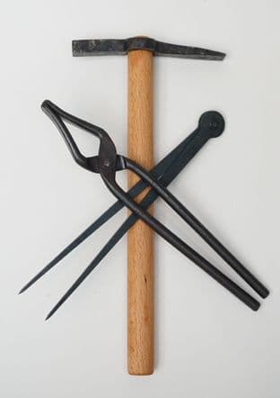 Multi period tool set roman to medieval hammer pliers and dividers