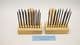 reenactment weaving pair of hand forged black steel wool combs