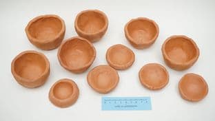 set of 11 iron age pottery style thumbpots