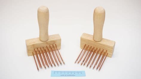 weavers pair of hand forged copper plated steel wool combs made in Sheffield England