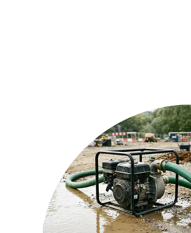 Pump removing debris filled water on a construction site