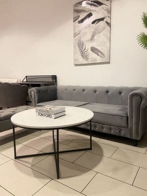 White Faux Marble Round Coffee Table With Black Frame