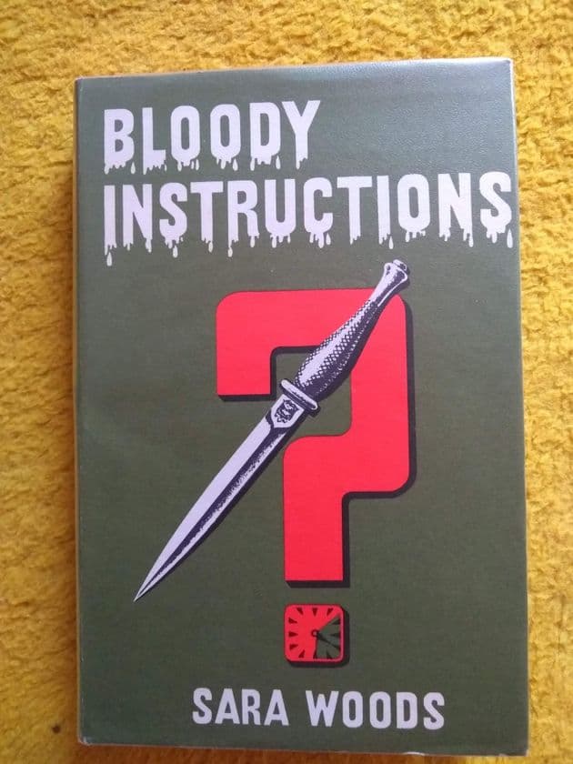 BLOODY INSTRUCTIONS BY SARA WOODS.   (THRILLER BOOK CLUB.)  (HARDBACK)