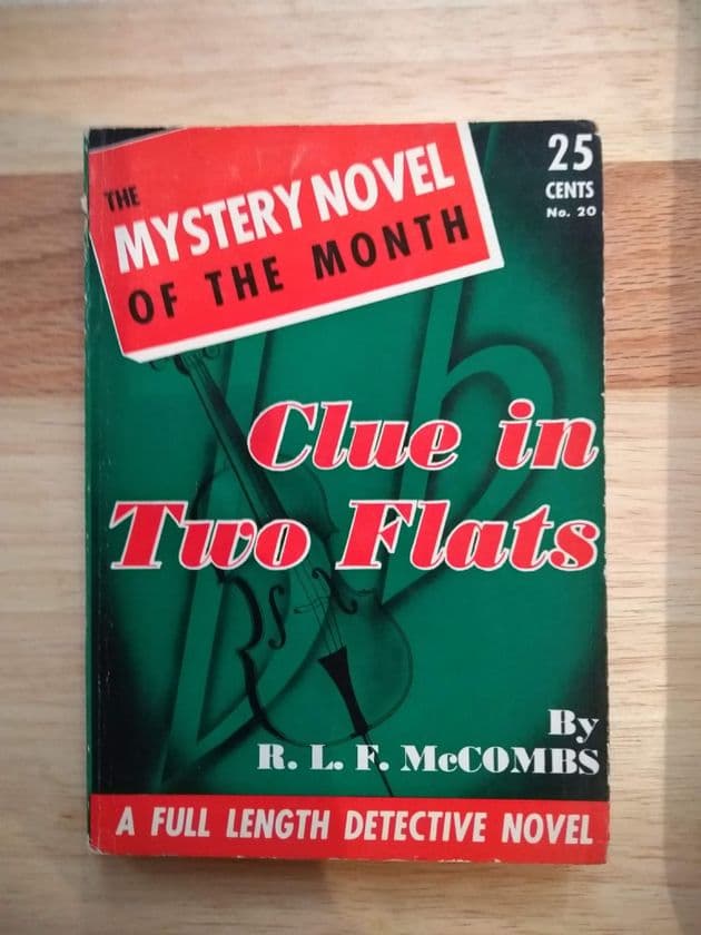 CLUE IN TWO FLATS by R.L.F McCOMBS (Paperback)