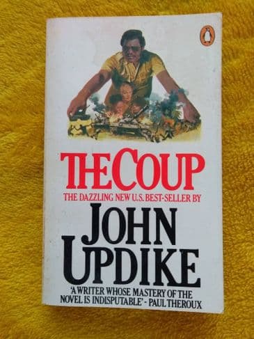 THE COUP BY JOHN UPDIKE.   (PAPERBACK)