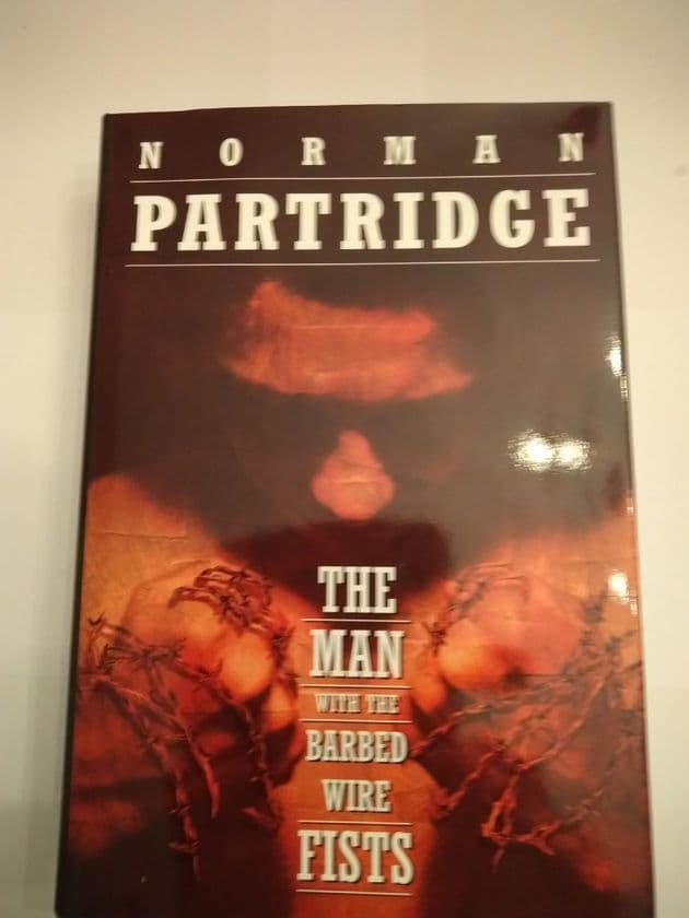 THE MAN WITH THE BARBED WIRE FIST'S by Norman Partridge (Signed Slipcased Hardcover)