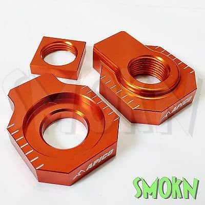 KTM Rear Axle Spindle Adjuster Blocks SX XC 125 200 250 06-12 Apico Orange