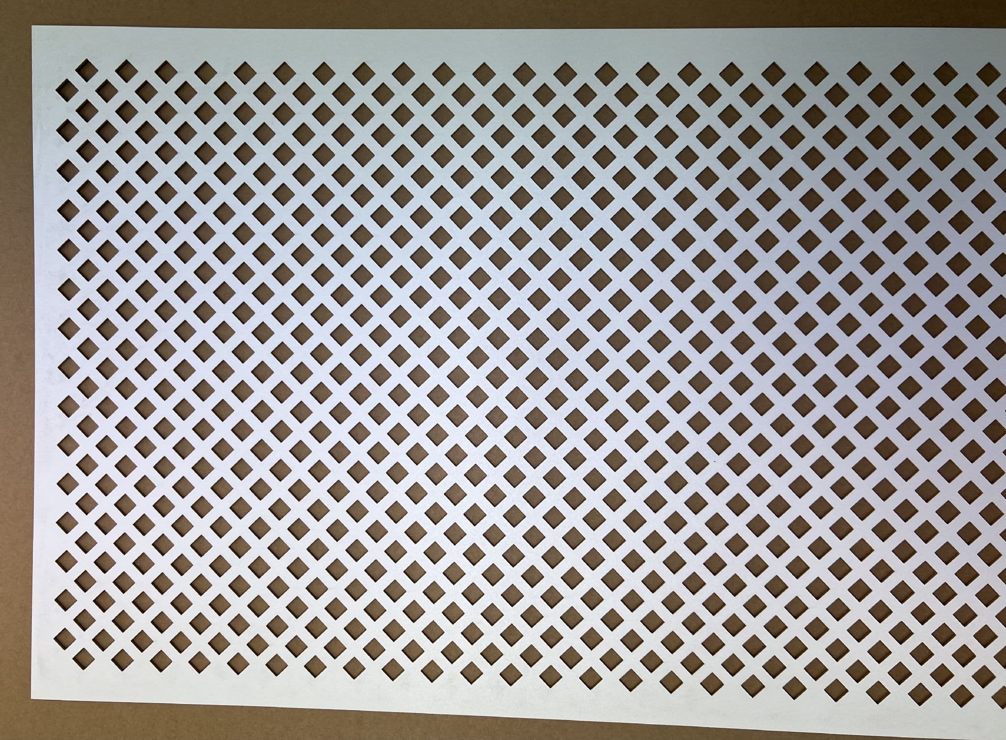 Manilla large diamond white faced perforated MDF screening panel