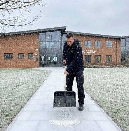 Using Rock Salt for Clearing Winter Ice and Snow.