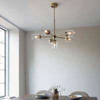 Bright nickel 6 light pendant with clear glass and adjustable stem