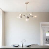 Bright nickel 6 light pendant with clear glass and adjustable stem