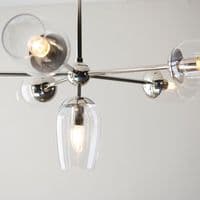 Bright nickel 6 light pendant with clear glass and adjustable stem