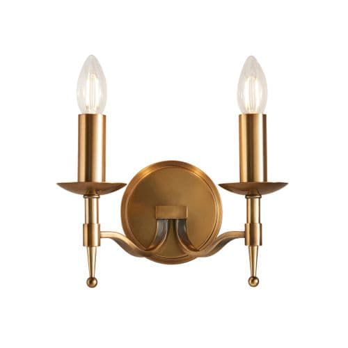 Stanford antique brass twin wall light with beautifully curved arms and simple clean detailing