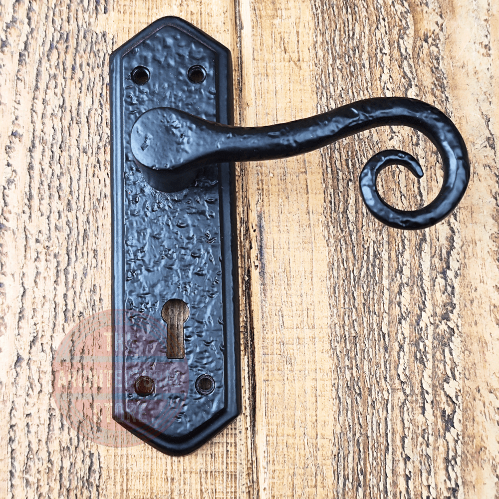 Curled Scroll Sprung Lever Door Handle On Antique Black Lock Plate