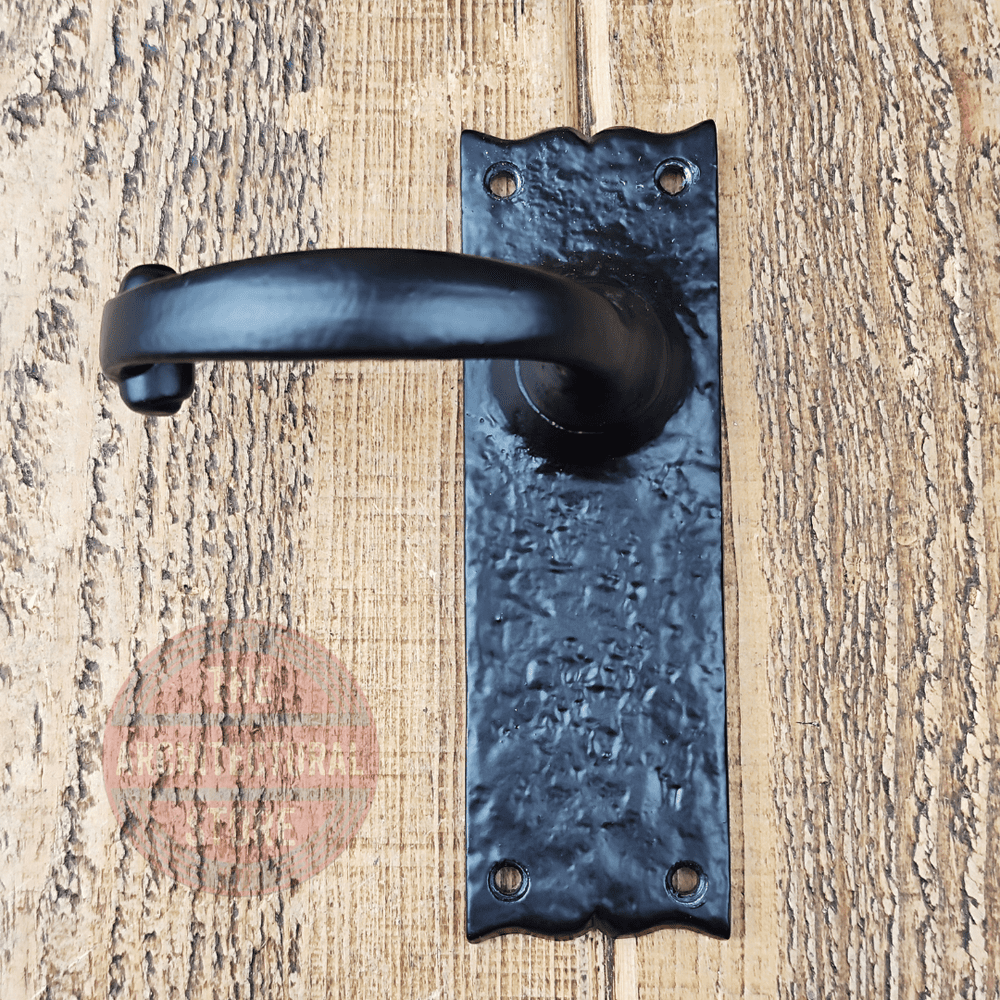 Curved C Shape Sprung Lever Door Handle On Antique Iron Decorative Backplate