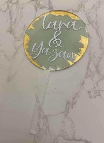 Names personalised with paint splash acrylic cake paddle topper