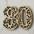 Number with cut out cake charm