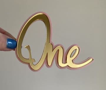 One double layer acrylic cake charm