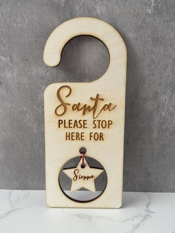 Personalised santa please stop her wooden door hanger