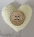 Pocket hug knitted heart