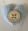 Pocket hug knitted heart