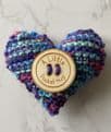 Pocket hug knitted heart