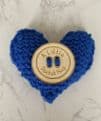Pocket hug knitted heart