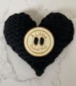 Pocket hug knitted heart