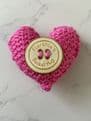 Pocket hug knitted heart