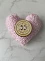 Pocket hug knitted heart