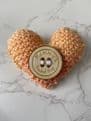 Pocket hug knitted heart
