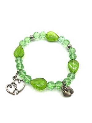 Glass Stretch Bracelet Green. S/P Charms.  STRBR0023