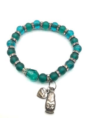 Glass Stretch Bracelet Teal. S/P Charms.  STRBR0021